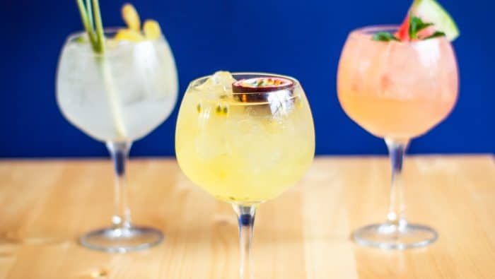 three clear drinking glass on table